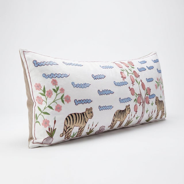 An extra-long lumbar pillow cover made from hand-embroidered Uzbek Suzani cotton — embroidered tigers under a pomegranate...