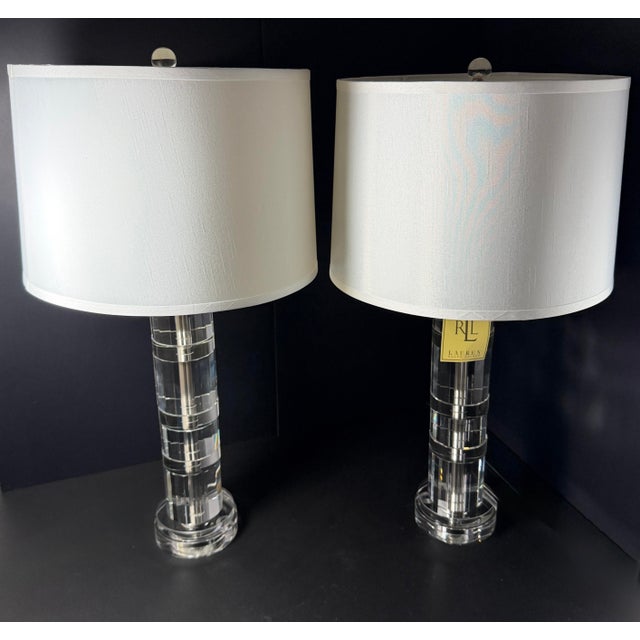 Striking crystal lamps in Ralph Lauren’s classic faceted-column design. This pair of table lamps is a testament to RL’s...