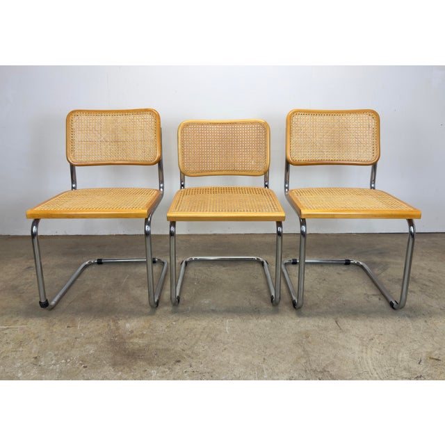 A set of 6 desirable and functional Breuer Cesca style cane and tubular chrome dining chairs circa 1970’s/1980’s. Includes...