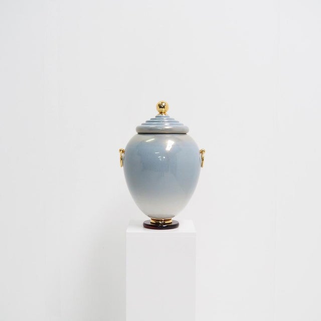 Handmade by the renowned Italian manufacturer Mangani, this large porcelain vase combines timeless design with luxurious...
