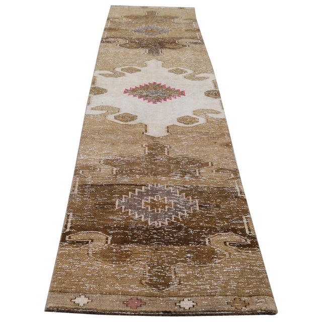 Hand-knotted with care using traditional rug-making techniques, this wool rug blends timeless craftsmanship with a modern...