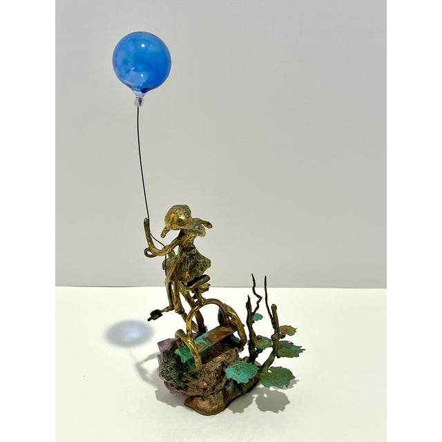 Girl On Bike With Balloon And Amethyst - Mixed Media Sculpture Signed “Borja” mixed-media sculpture featuring a whimsical...