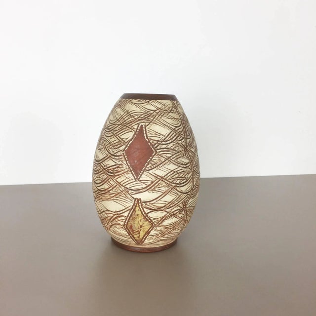 Pottery ceramic vase Producer: Sawa Ceramic, Germany Design: Franz Schwaderlapp Decade: 1960s Description: Original...