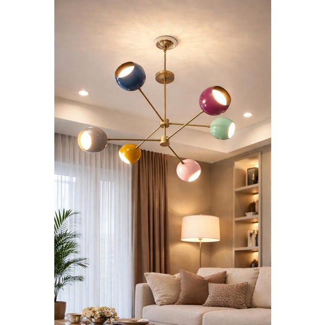 Transform your space with this multi-color 6 arm brass sputnik chandelier, inspired by iconic mid-century modern design....