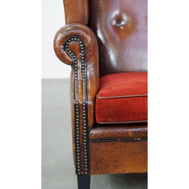 Vintage Leather Wing Chair with Red Corduroy Seat Cushion For Sale - Image 9 of 14