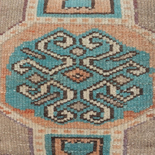 Add a touch of history and warmth to your space with this vintage handmade Turkish wool rug cushion cover. Crafted from...