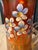 This Antique Fenton Carnival Glass Pitcher with the "Forget-Me-Not" pattern is a stunning piece of vintage collectible...
