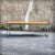 Monumental coffee table composed of an oak veneer top framed by a solid oak band, resting on a chromed steel base. This...