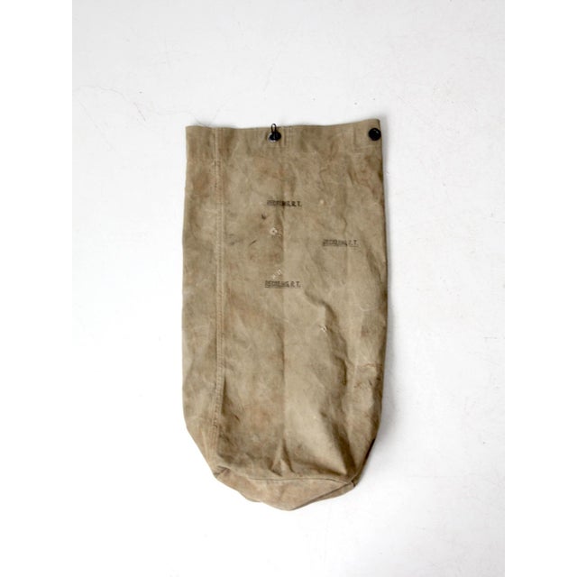 Mid-century canvas mail sack with original rural route stencil markings. Constructed of heavy-duty canvas with reinforced...