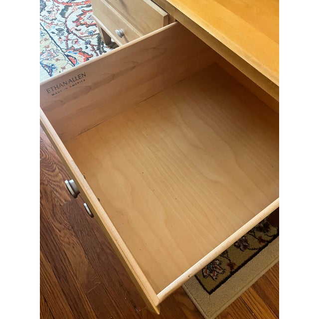 Ethan Allen coffee table from the modern "Elements" collection. Solid maple wood in a warm "Fawn" finish with steel accent...