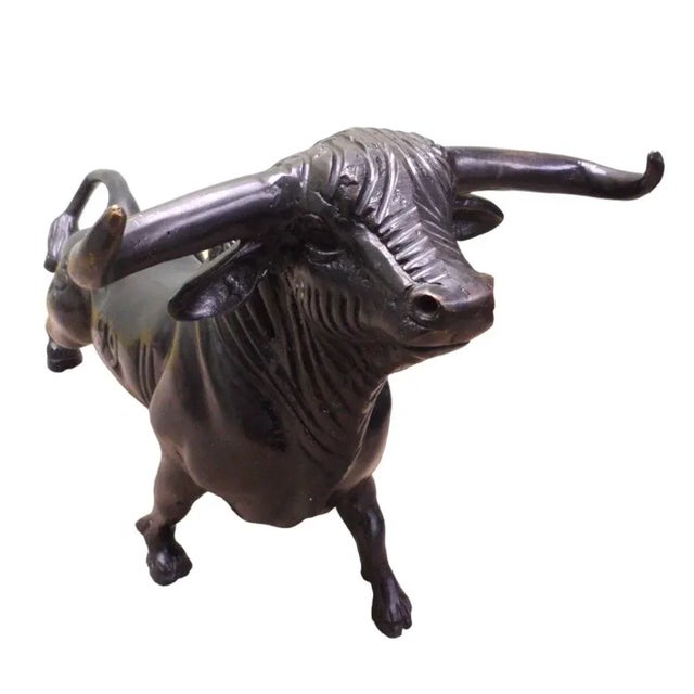 Very awesome Large and Heavy Bronze Bull. Will give elegance to any table top. Great collector’s piece.