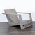 This modern chair features a sturdy teak frame with a stylish weathered finish. The wide armrests and inclined back...