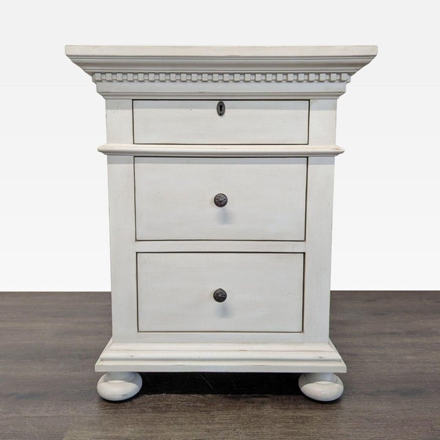 Evoking the architectural classicism of turn-of-the-century design, these nightstands by designer Geoffrey Hawkes are...