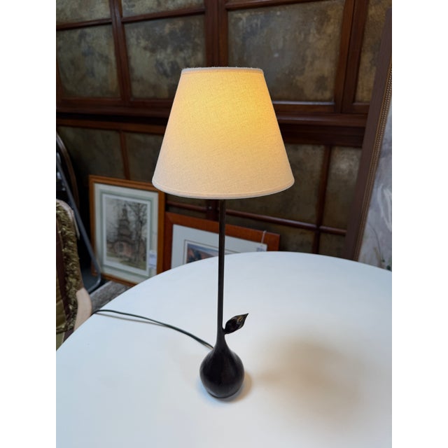 Design Plus Gallery presents a Vintage Pear Table Lamp. The lamp is made from cast metal and is shaped like a pear at the...