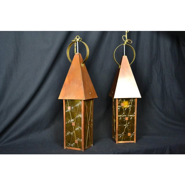 Vintage arts and crafts style copper pendant lights with acrylic shades from the mid century era. Arts and crafts style...