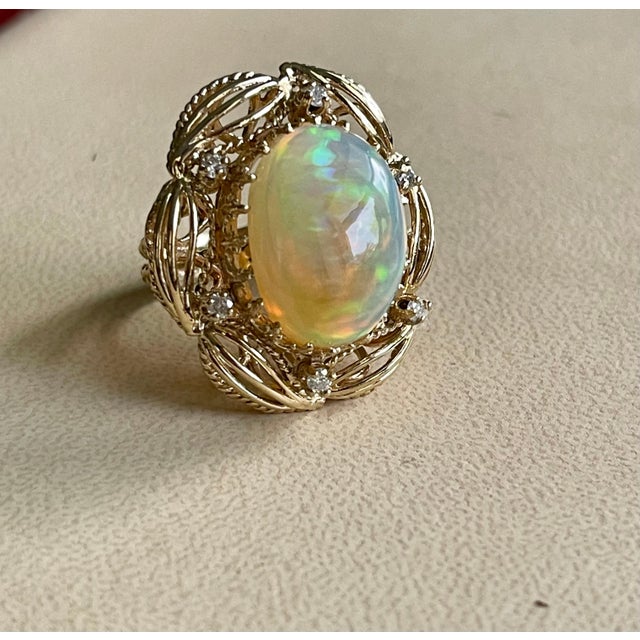 15 Carat Oval Shape Ethiopian Opal Cocktail Ring 14 Karat Yellow Gold Solid Ring For Sale In New York - Image 6 of 18