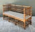 This vintage carved oak spindle bench is a beautifully crafted seating piece that blends rustic character with timeless...
