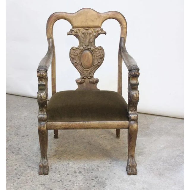 This magnificent Odd Fellows Fraternal Lodge 'throne' (circa 1910-1920) with carved and painted decoration throughout is a...