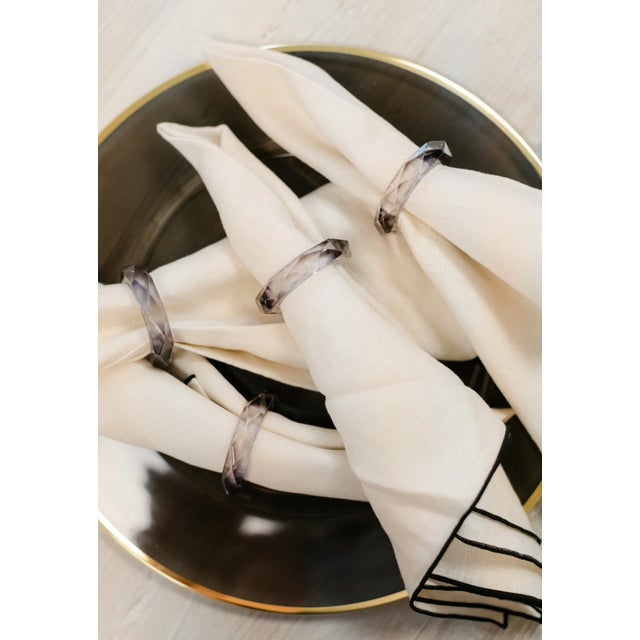 Bold yet refined, the Charcoal Prism Napkin Rings anchor your setting with smokey depth. Its polished lucite surface is a...
