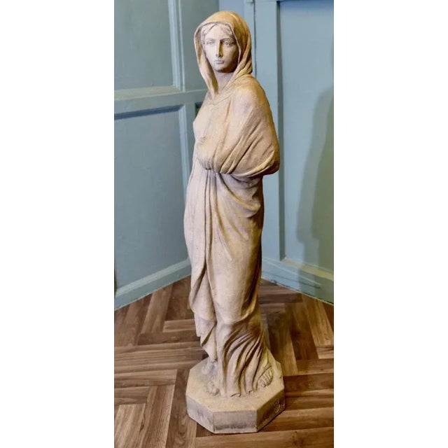 Royal Doulton Buff Terracotta Statue of a Woman Signed C G This statue is marked Royal Doulton and signed next to the...