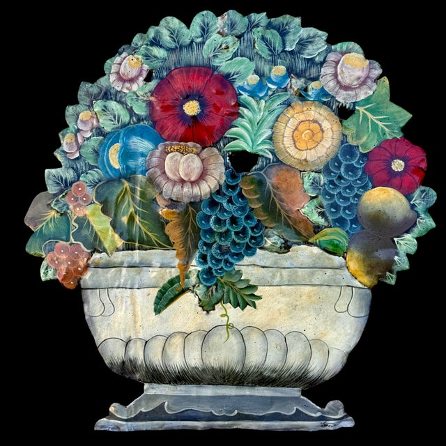 This large vintage toleware fire screen features a vibrant, hand-painted floral and fruit basket design, signed by the...
