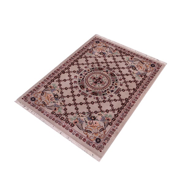 Designed with mesmerizing intricacy and gorgeous color palette, this hand-knotted masterpiece demonstrates the beauty and...