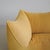 Original vintage 'BAMBOLE' sofa, with recent upholstery in mustard/yellow velvet fabric. What makes this sofa special is...