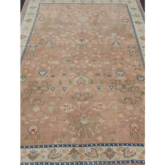 Mid 20th Century Colorful Turkish Oushak Rug in Salmon Background With All-Over Floral Design For Sale - Image 4 of 13