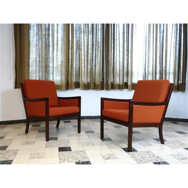 This pair of classic Danish lounge chairs was designed by Ole Wanscher for the Danish high-quality manufacturer Poul...