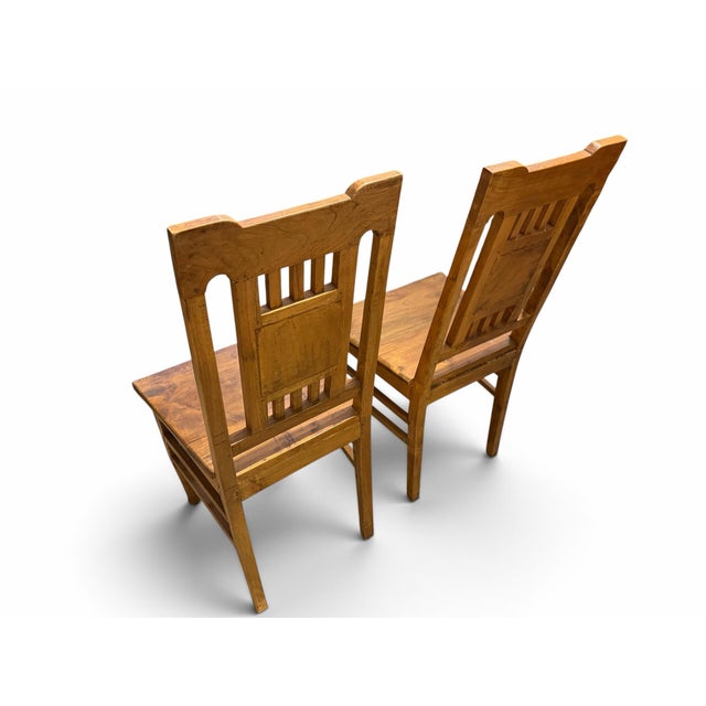 Pair of Vintage Dutch Colonial Hand-Carved Teak Crown Motif Dining Chairs For Sale - Image 4 of 7