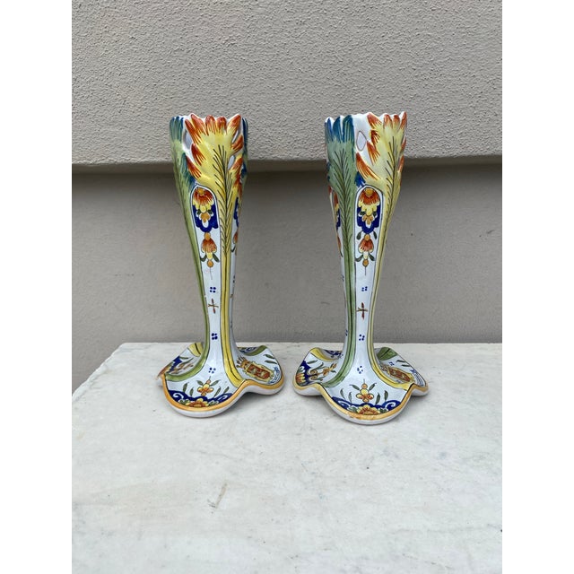 Pair of French Faience Vases Circa 1900. Decorated with leaves on the top , coat of arms on the base.