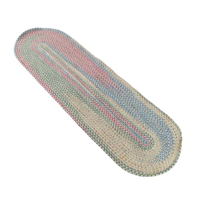 Vintage woven braided geometric oval area rug runner / carpet / mat featuring a rainbow of colors Dimensions: 84" x 24.5"...