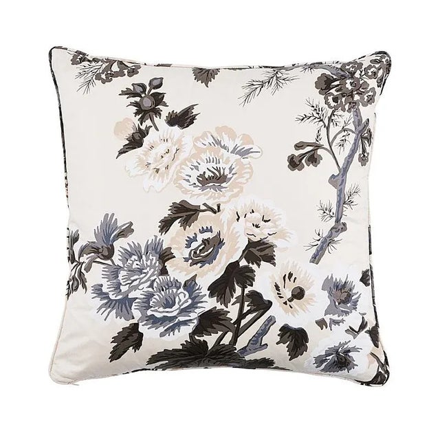 This pillow features Pyne Hollyhock with a self welt finish. This chintz pattern was famously used by designer Albert...