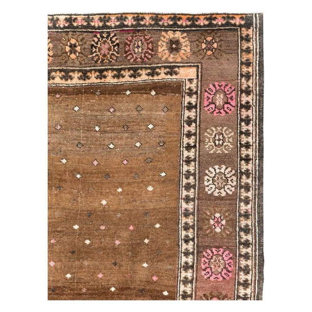 A vintage Turkish Anatolian gallery carpet handmade during the mid-20th century. Measures: 6' 8" x 11' 10".