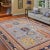 "Enhance the ambiance of your home with this magnificent Persian-influenced Turkish hand-knotted rug made by skilled...