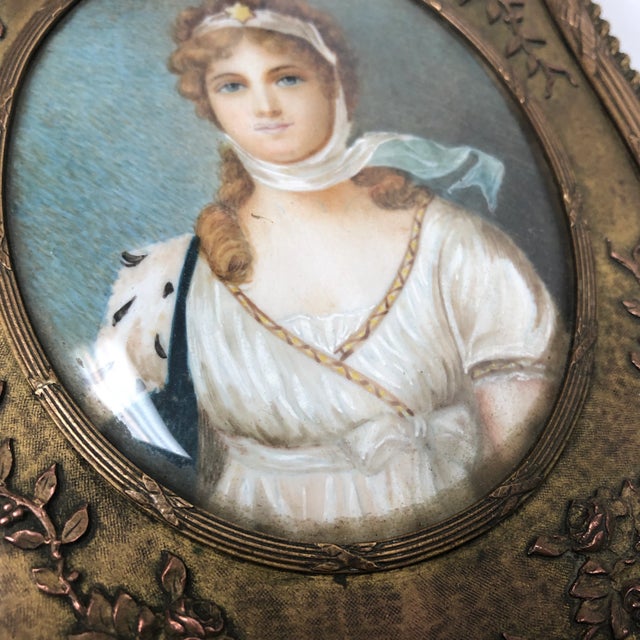 Beautiful French metal jewelry box with hand painted portrait encased in glass. The piece was made circa 1875.