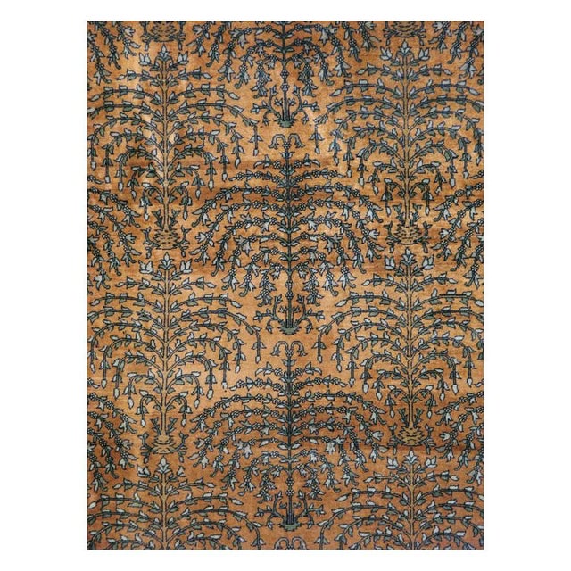 An antique Indian Lahore 9' x 12' room size rug handmade during the early 20th century featuring an all-over weeping...