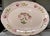 Made in Italy. Hand painted and glazed terra cotta with sponge wear motif scallop border and rose design. Peachy pink with...