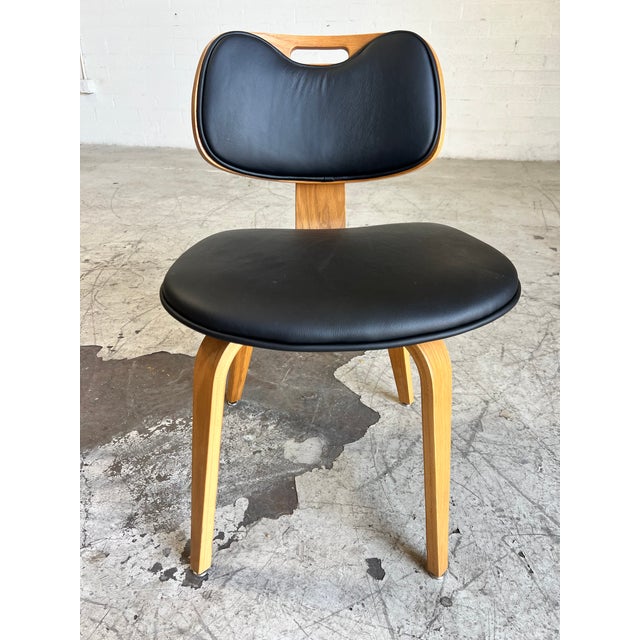 Newly refinished and reupholstered dining or side chair by Thonet, featuring blonde bentwood back and legs, and buttery...