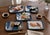 Circa 1980s Japanese blue-and-white ceramic sushi plates, made in Japan for Takahashi San Francisco. Each plate features a...