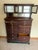 Antique early 20th Century mahogany dental cabinet with hutch featuring three frosted and raised diamond patterned glass...
