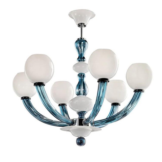 A luxury lighting solution with a distinctly modern style, this glass chandelier belongs to the Gritti Collection...