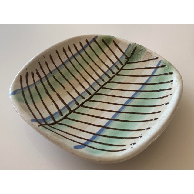 An incredibly rare early 1940s dish designed and decorated by Lee Rosen for Design-Technics. This early dish predates...