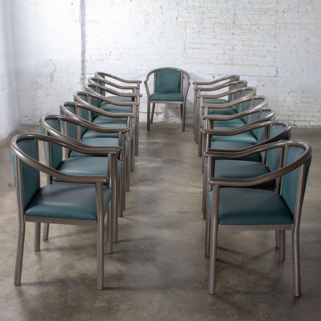 Wonderful vintage Modern set of 15 MTS Seating dining or waiting room chairs composed of gray lacquered cylindrical metal...