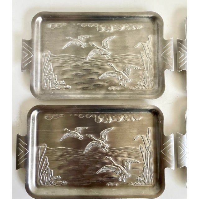 Here is a great set of FOUR small/petite trays made in Japan in the mid-century. Each tray has handles on the ends and a...