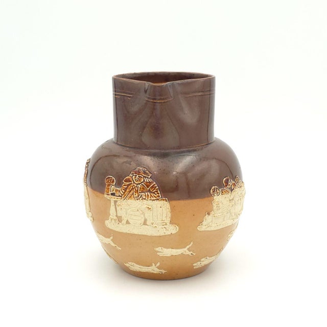 A Doulton bargeware pitcher, England, 19th century.