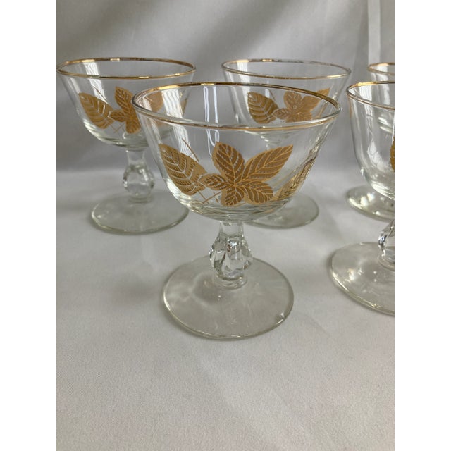 This beautiful set of eight Golden Foliage dessert glasses captures the sophistication of mid-century entertaining. Each...