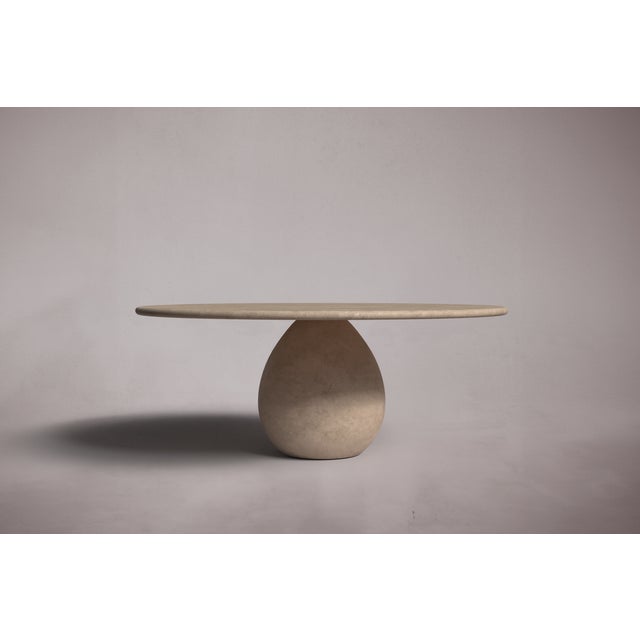 Crafted and hand-finished from solid blocks of cross-cut Travertine, each piece exhibits the inherent variations in color,...