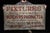 Large hand-painted tin trade sign advertising fixtures installed by The Butchers Products Co. Bold red and black lettering...