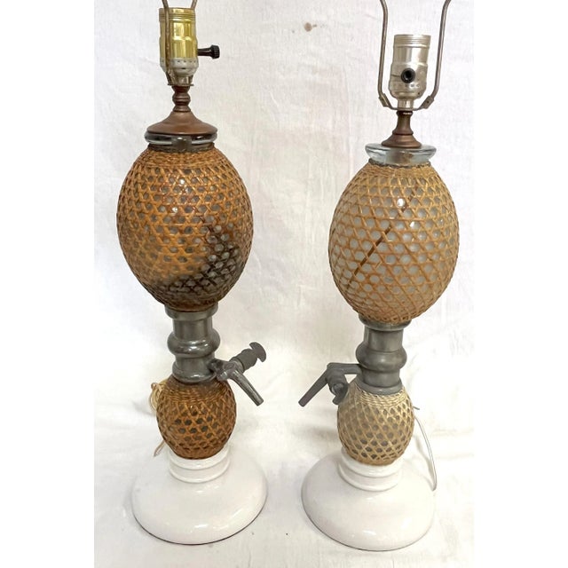 Cool pair of Antique French 'Briet Brevete' seltzer bottle lamps. These seltzer bottles are from the late 19th or early...